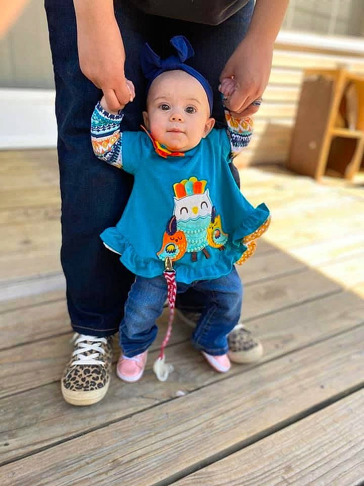 Miracle is registered to the contest to win money with this photo: baby, blue, child, footwear, fun, happy, jeans, outerwear, person, play, shoe, smile, t_shirt, toddler