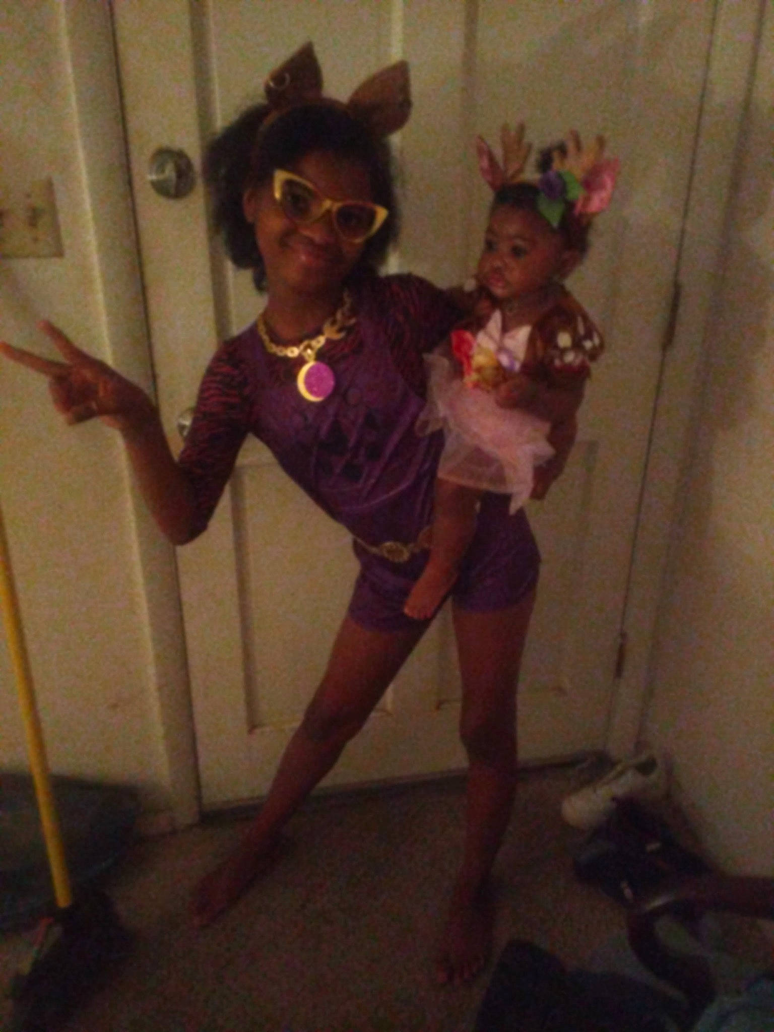 Zariah joined the competition — help win amazing prizes! barefoot, event, eyewear, fashion_design, flooring, fun, goggles, happy, human_body, human_leg, joy, knee, person, room, sandal, shoulder, sunglasses, t_shirt, thigh, toddler