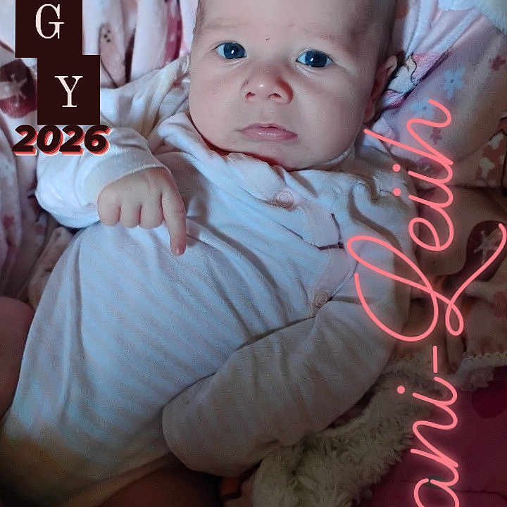 Imani-Leiih is registered to the contest to win money with this photo: baby, infant, blanket, onesie, face, blue_eyes, lying_down, soft_texture, pacifier, child, newborn, cute, portrait, cozy, indoor, person, sleepwear, closeup, young, expression