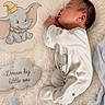 baby, newborn, sleeping, onesie, blanket, plush, elephant_cartoon, cloud_pillow, stars, soft_texture, cute, peaceful, infant, cozy, child, nursery, decor, fabric, toddler, rest