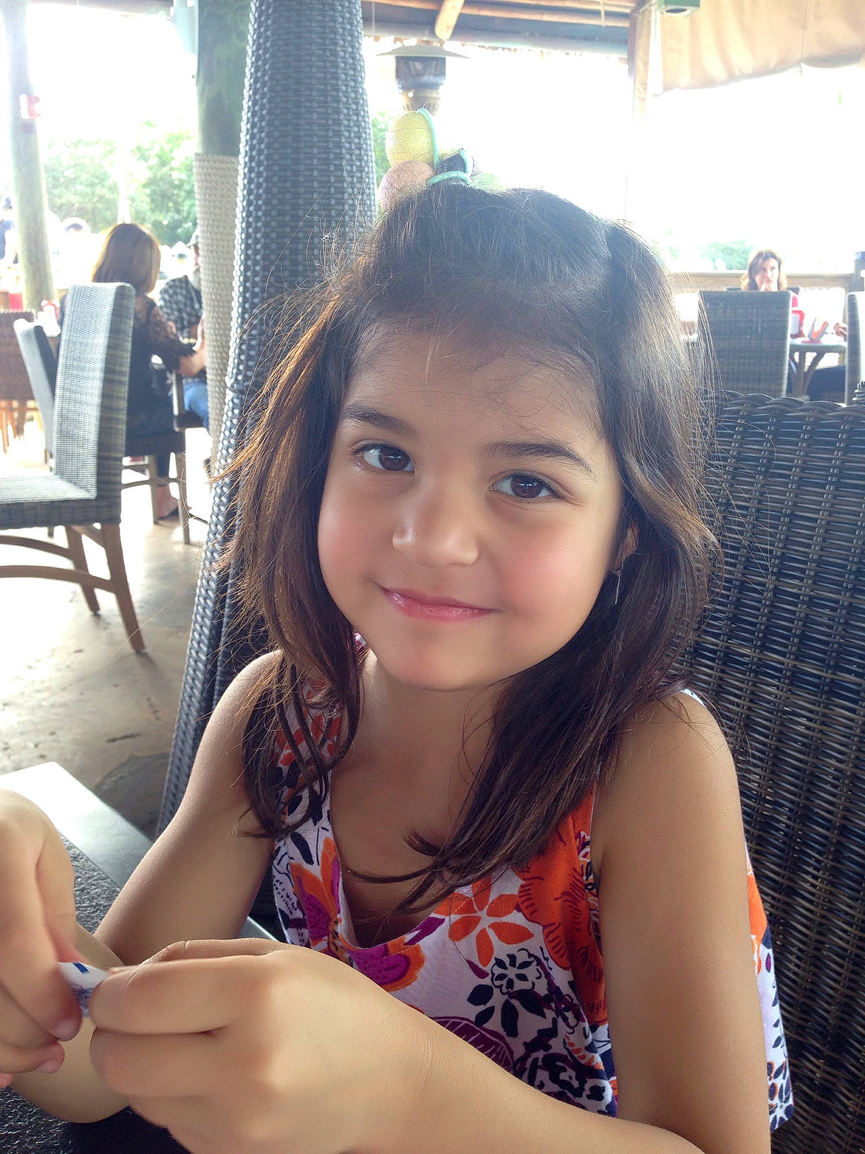 Ariannah joined the competition — help win amazing prizes! black_hair, brown_hair, chair, child, finger, fun, hand, happy, human_leg, joy, leisure, long_hair, people, person, recreation, sitting, skin, smile, summer, thigh