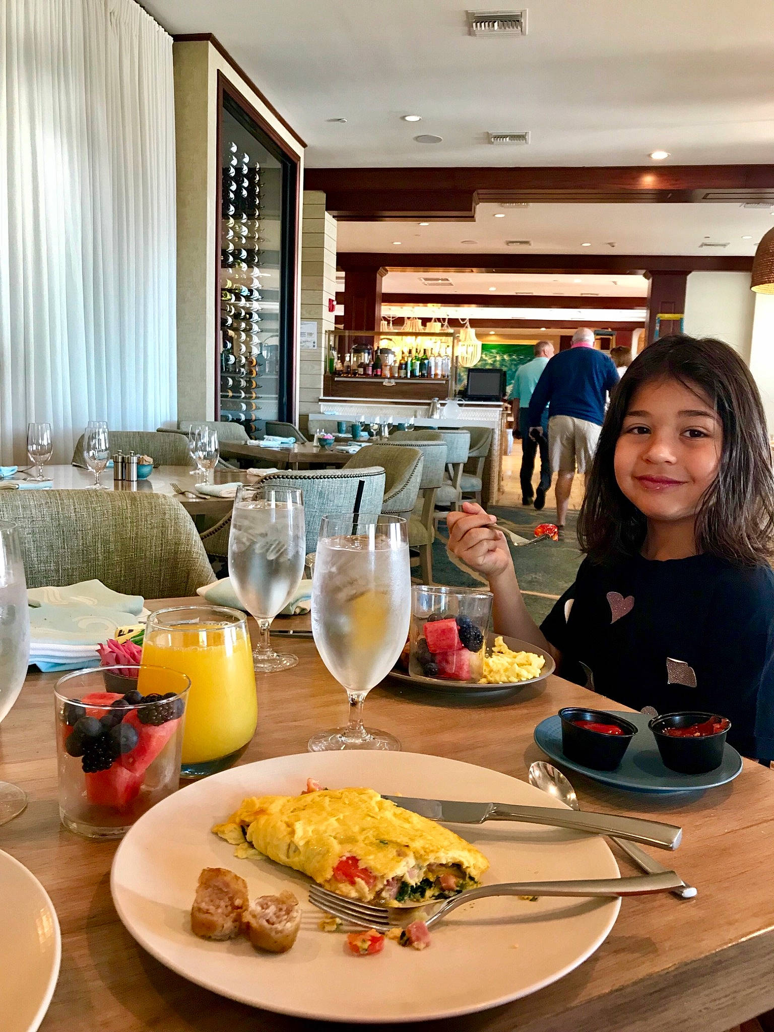 Ariannah is registered to the contest to win money with this photo: chair, cuisine, cup, curtain, dishware, drinkware, event, food, fruit, furniture, ingredient, joy, juice, knife, person, plate, recipe, serveware, stemware, table