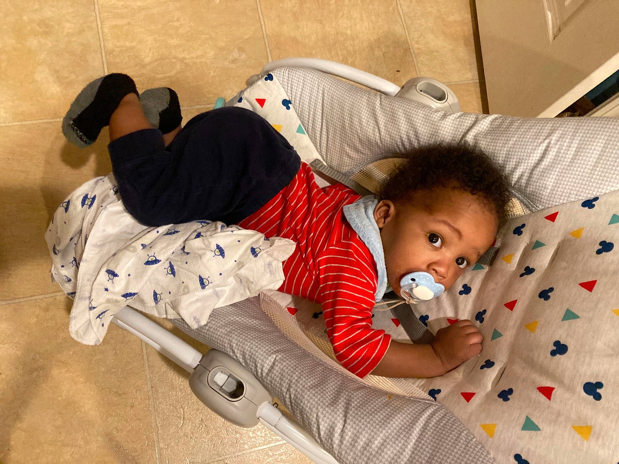 Rico is registered to the contest to win money with this photo: baby, baby_products, baby_sleeping, baby_toddler_clothing, baby_toys, bedtime, carmine, child, comfort, flooring, fun, linens, mammal, nap, person, play, room, sitting, sock, stuffed_toy