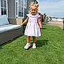 Christiana joined the competition — help win amazing prizes! child, girl, dress, pink, hair_ties, outdoor, grass, shoes, smiling, sunny, house, window, sofa, cushion, shadow, person, daylight, happy, lawn, residential
