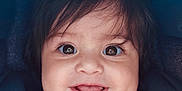 Ariella is registered to the contest to win money with this photo: baby, child, chubby_cheeks, closeup, cute, expression, eyes, face, hair, happy, head, indoors, infant, joyful, person, portrait, skin, smile, tongue, young