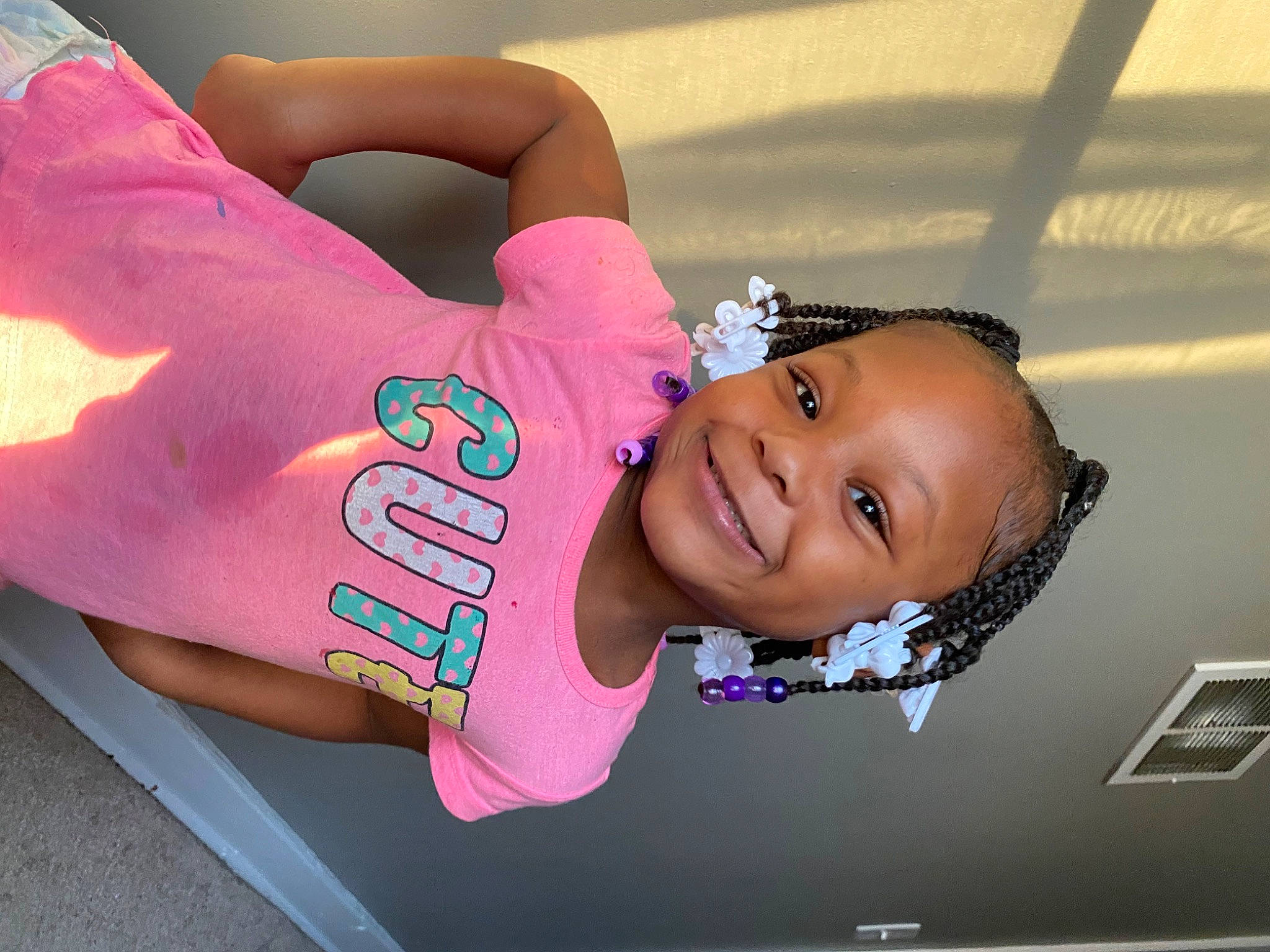 Aubree is registered to the contest to win money with this photo: abdomen, chest, child, elbow, flash_photography, fun, gesture, happy, human_leg, joy, leisure, magenta, person, pink, sleeve, smile, sportswear, t_shirt, thigh, toddler