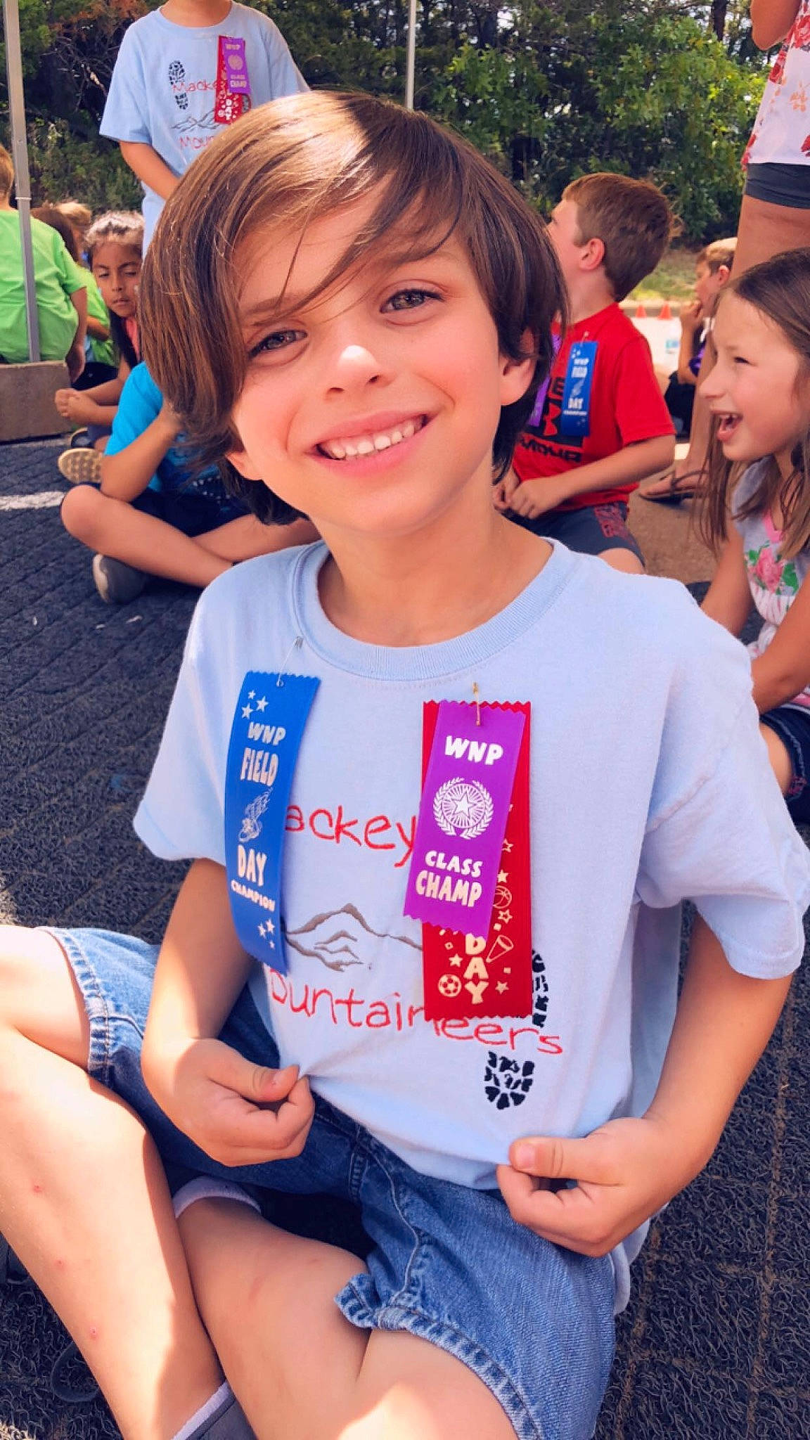 Jaydin is registered to the contest to win money with this photo: blue, electric_blue, eye, face, facial_expression, fun, hairstyle, happy, joy, leisure, organ, person, public_space, recreation, shorts, smile, snapshot, style, summer, t_shirt