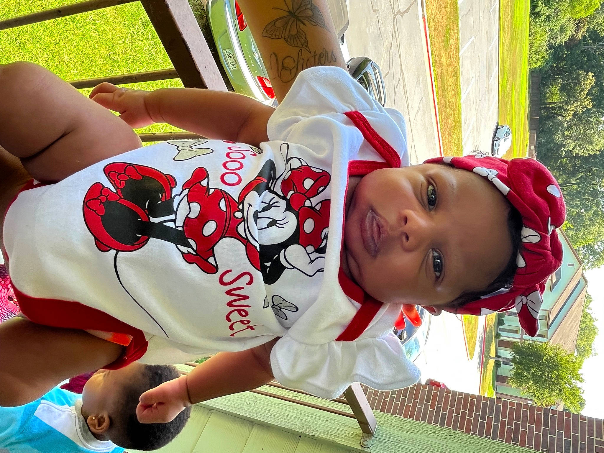Mytraeh Dorsey joined the competition — help win amazing prizes! baby_toddler_clothing, black_hair, carmine, child, elbow, fun, grass, green, happy, hat, human_leg, leisure, pattern, person, plant, red, sitting, thigh, toddler, tree