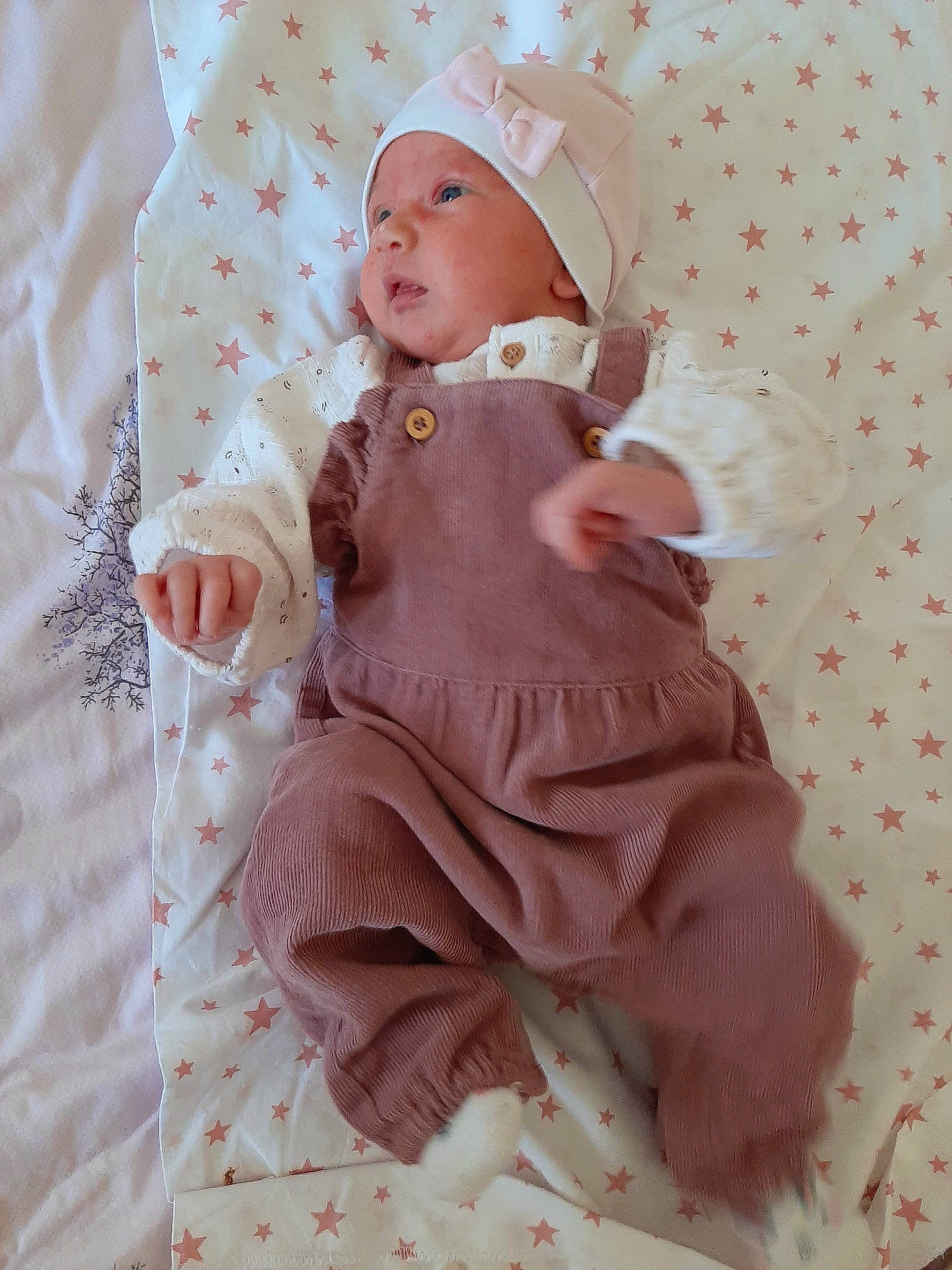 Camelia participe au concours pour gagner de l'argent avec cette photo : baby, baby_products, baby_sleeping, baby_toddler_clothing, child, collar, comfort, embellishment, fur, headwear, linens, magenta, pattern, peach, person, pink, sitting, sleeve, textile, toddler