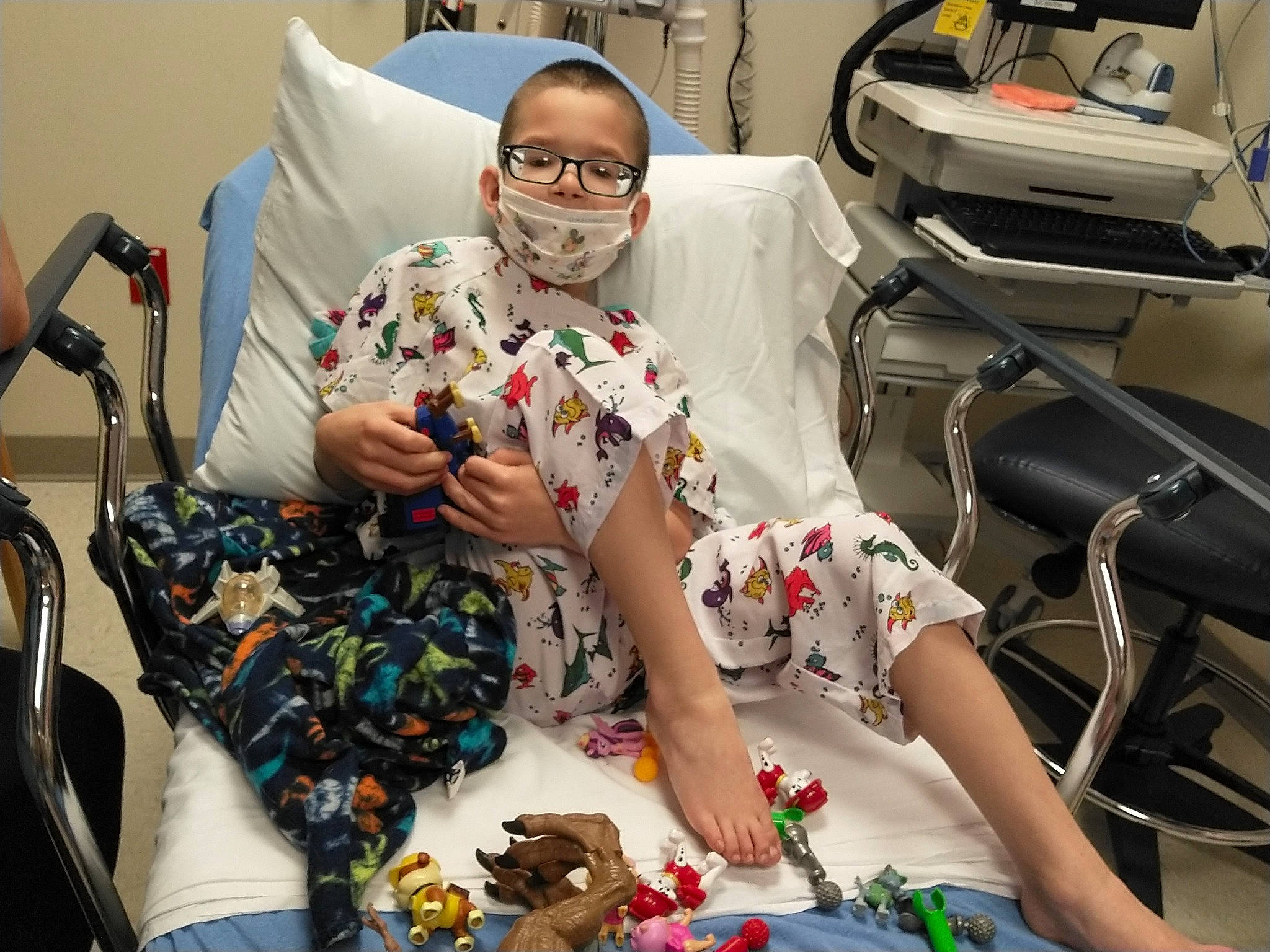 Aaron is registered to the contest to win money with this photo: art, automotive_design, bag, comfort, design, event, eyewear, fashion_design, fun, health_care, luggage_and_bags, medical_equipment, motor_vehicle, patient, pattern, person, room, sandal, service, sitting