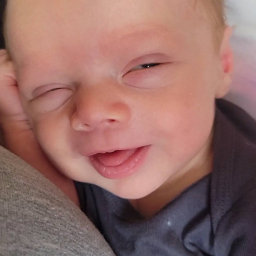 Cayde is registered to the contest to win money with this photo: baby, baby_making_funny_faces, baby_toddler_clothing, cheek, comfort, ear, eyebrow, eyelash, face, gesture, happy, iris, jaw, lip, mouth, nose, person, skin, sleeve, smile