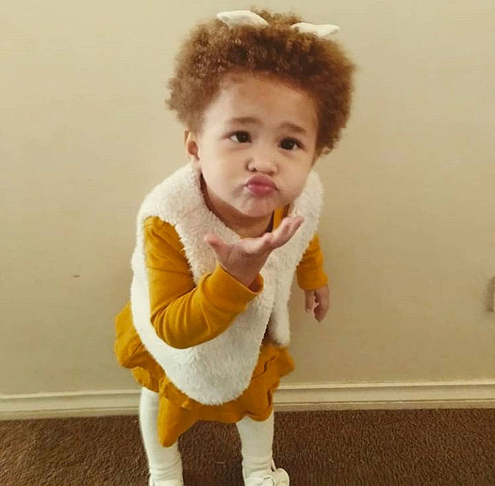 Havana joined the competition — help win amazing prizes! cheek, child, costume, face, fur, hair, hairstyle, head, joint, outerwear, person, sleeve, smile, standing, t_shirt, toddler, top, yellow