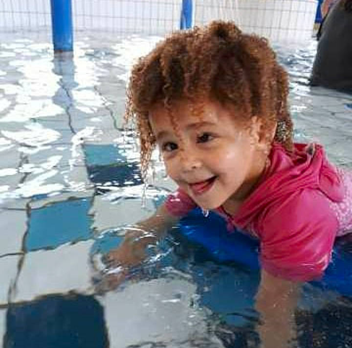 Havana is registered to the contest to win money with this photo: child, fun, joy, leisure, person, play, recreation, smile, swimming_pool, toddler, vacation, water, water_park