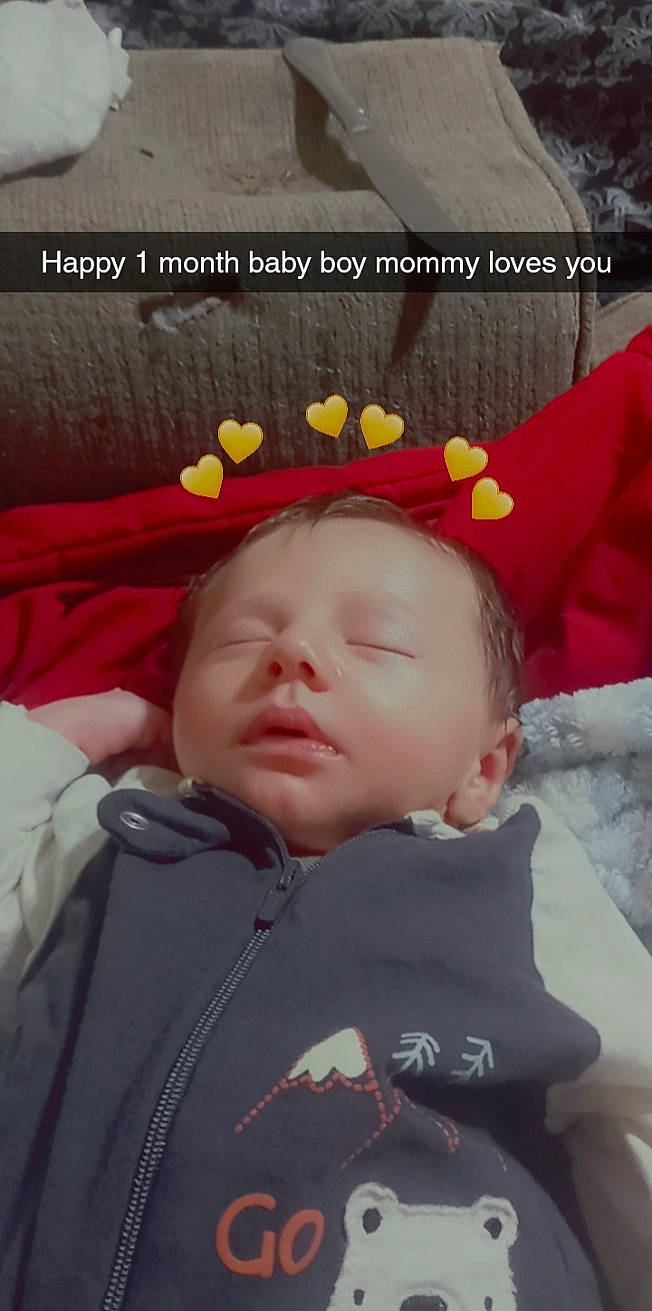 Josiah is registered to the contest to win money with this photo: baby, baby_products, baby_sleeping, baby_toddler_clothing, beanie, bedtime, cheek, child, comfort, eyebrow, fashion_accessory, font, forehead, fun, happy, linens, mouth, person, photo_caption, skin