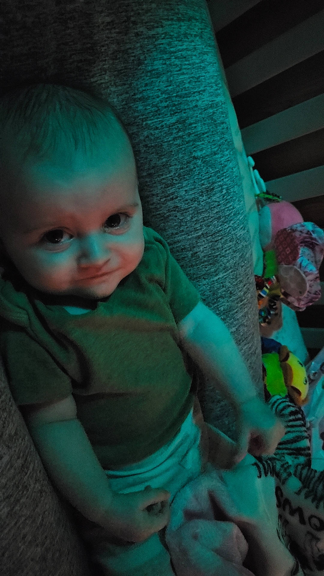 Riley joined the competition — help win amazing prizes! aqua, azure, baby, baby_toddler_clothing, cheek, child, comfort, cool, fun, grass, happy, iris, linens, nose, person, sitting, skin, smile, t_shirt, textile