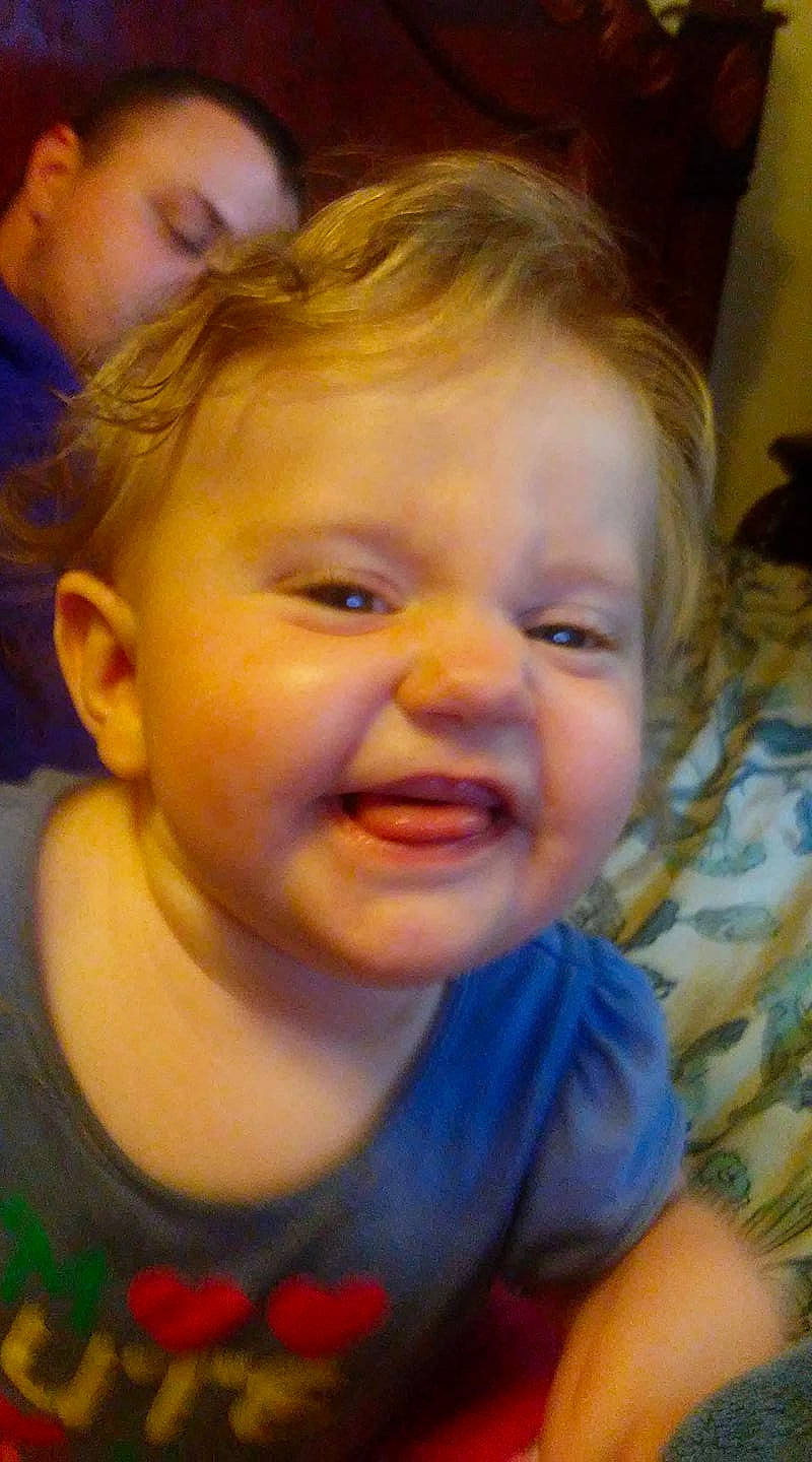 Ellie is registered to the contest to win money with this photo: boy, cheek, child, chin, emotion, eye, face, facial_expression, forehead, hair, head, human_hair_color, infant, laughter, lip, nose, person, skin, smile, toddler