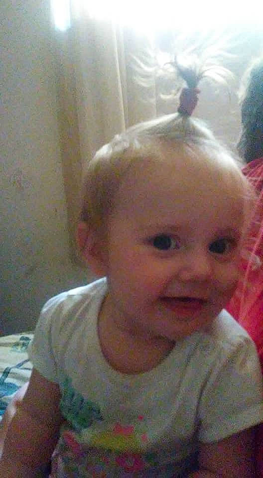 Ellie is registered to the contest to win money with this photo: cheek, child, chin, day, ear, eye, eyebrow, face, forehead, girl, hair, hairstyle, head, human_hair_color, infant, lip, nose, person, skin, toddler