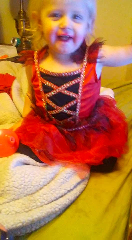 Purity is registered to the contest to win money with this photo: child, clown, orange, person, toddler