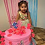 Lucia joined the competition — help win amazing prizes! child, birthday_cake, pink_cake, flowers, cartoon_characters, pink_bows, dress, streamers, celebration, party, table, smile, girl, decorations, pink, blue, heart_shapes, icing, candle, happy