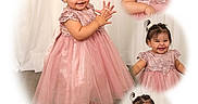 Lucia is registered to the contest to win money with this photo: baby, child, collage, cute, dress, floor, footwear, girl, hair_bows, happy, lace, person, pink_dress, playful, portrait, sitting, smile, standing, studio, toddler