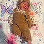 adorable, baby, blanket, butterfly, child, clothing, cozy, cute, floral_pattern, hat, indoors, infant, knitted_outfit, newborn, portrait, resting, sleeping, soft, teddy_bear, warm