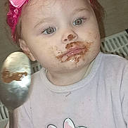 Sheryl participe au concours pour gagner de l'argent avec cette photo : baby, child, chocolate, clothing, cute, expression, face, food, hand, headband, indoor, messy_face, minnie_mouse, person, pink_bow, portrait, shirt, spoon, toddler, young_child