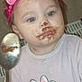 baby, child, chocolate, clothing, cute, expression, face, food, hand, headband, indoor, messy_face, minnie_mouse, person, pink_bow, portrait, shirt, spoon, toddler, young_child