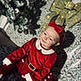 baby, bow, carpet, child, christmas_tree, cozy, cute, decorations, festive, happy, headband, holiday, indoor, lights, portrait, red_clothing, seasonal, sitting, smile, toddler