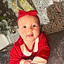 Ivy-Mai joined the competition — help win amazing prizes! baby, child, red_clothing, headband, bow, face, portrait, holiday, christmas, decorations, snowman, indoors, cute, happy, smiling, infant, closeup, soft_focus, festive, warm