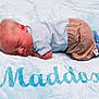 Maddox is registered to the contest to win money with this photo: baby, sleeping, blanket, blue, clothing, cute, face, infant, newborn, peaceful, plush, portrait, resting, soft, toddler, young, child, cozy, comfort, nap
