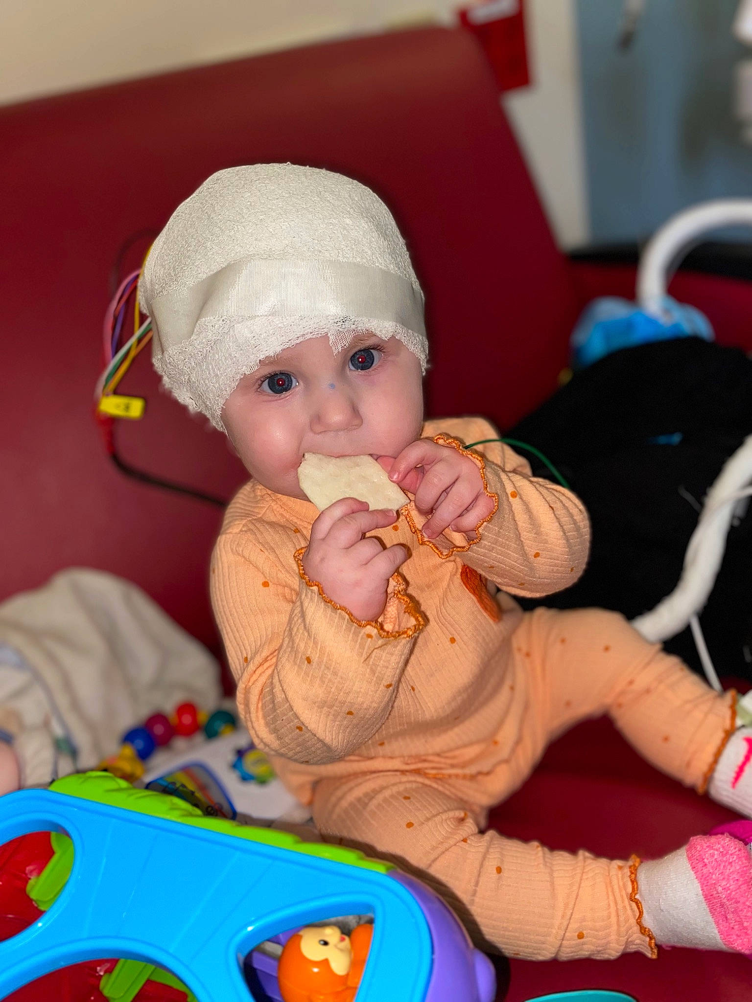 Aurelia joined the competition — help win amazing prizes! baby, baby_playing_with_toys, baby_products, baby_toddler_clothing, baby_toys, beanie, cap, cheek, child, drinkware, event, fictional_character, fun, happy, headwear, person, play, room, sitting, skin