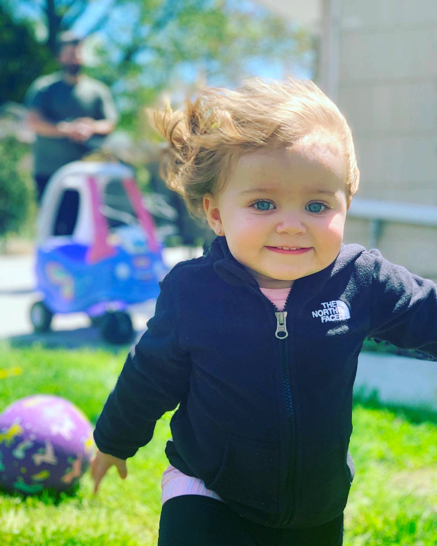 Lilliana Gail joined the competition — help win amazing prizes! baby_toddler_clothing, electric_blue, facial_expression, football, fun, grass, green, happy, joy, leisure, people, people_in_nature, person, plant, recreation, smile, soccer, sports_equipment, summer, t_shirt