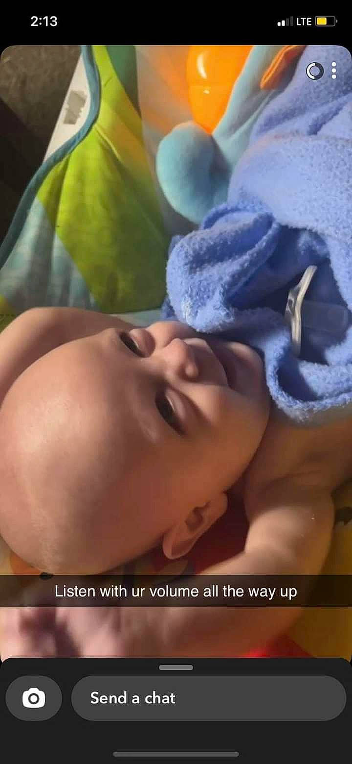 Noah is registered to the contest to win money with this photo: art, baby, baby_sleeping, bedtime, cheek, chest, child, close_up, eyelash, flash_photography, happy, headgear, iris, linens, mouth, nose, organism, person, petal, skin