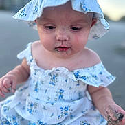 Oakley joined the competition — help win amazing prizes! baby, infant, child, portrait, floral_dress, bonnet, hat, blue_and_white, sitting, outdoor, close_up, face, eyes, hands, serious_expression, fashion, soft_lighting, blurred_background, detailed_clothing, photography