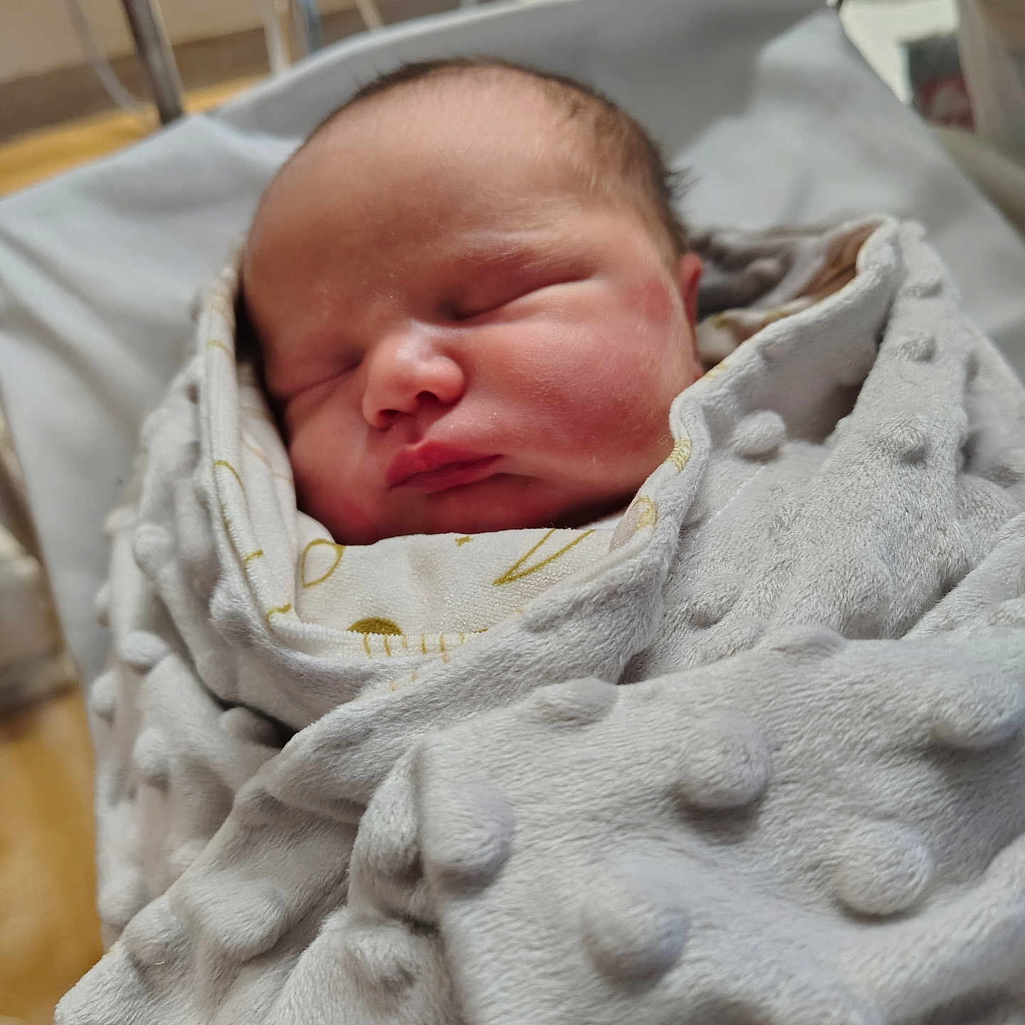 Aivar is registered to the contest to win money with this photo: baby, bassinet, blanket, child, closeup, cute, face, head, hospital, indoors, infant, newborn, newborn_baby, peaceful, person, resting, sleeping, soft_texture, warm, wrapped