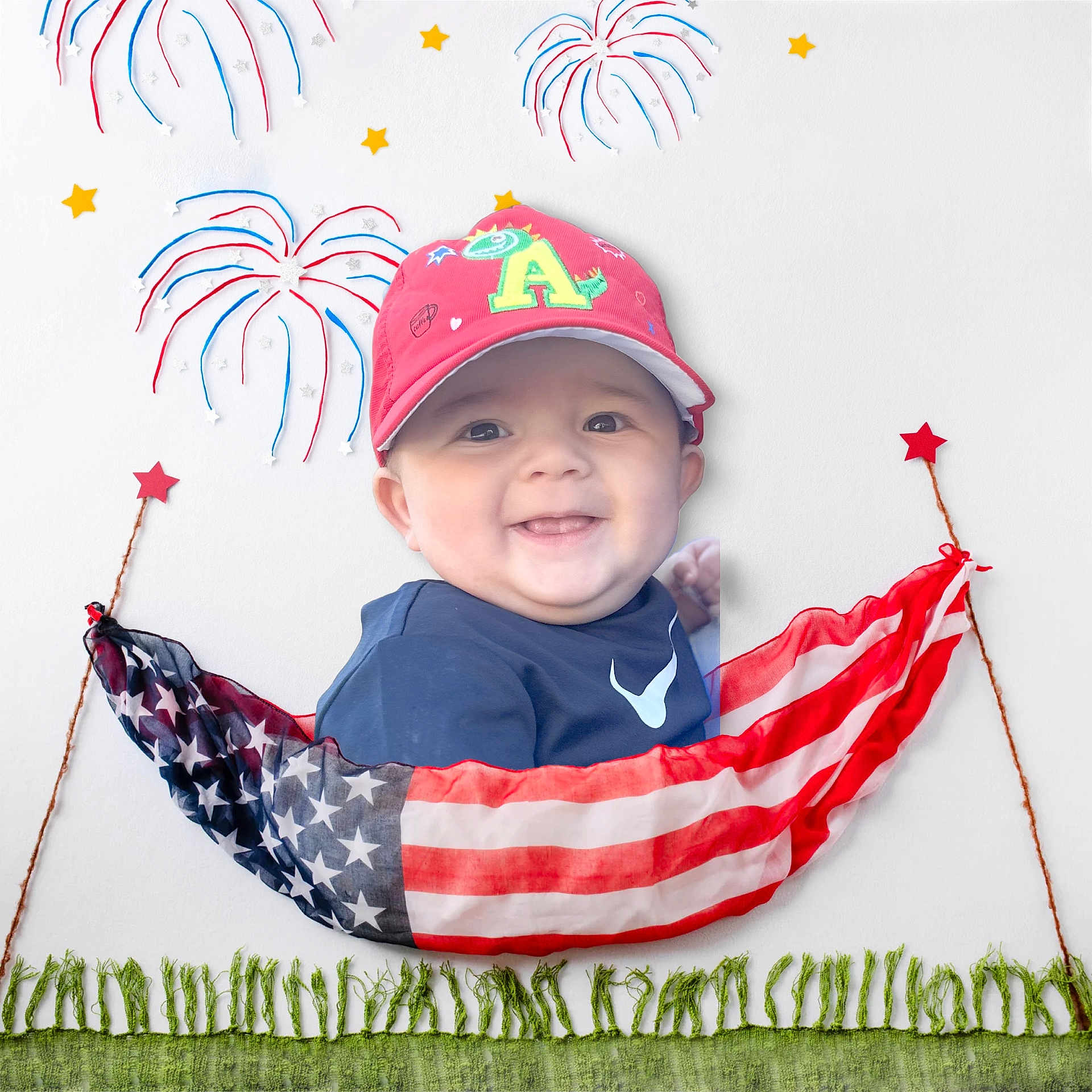 Duvan joined the competition — help win amazing prizes! american_flag, baby, background, blue, cap, celebration, child, cute, face, fireworks, grass, green, hammock, playful, portrait, red, smiling, stars, white, yarn