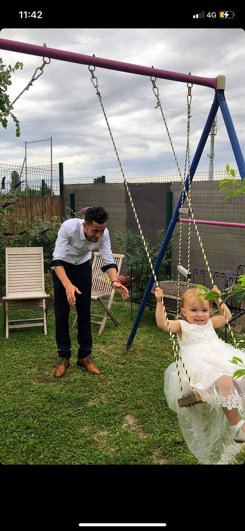 Lyana participe au concours pour gagner de l'argent avec cette photo : baby, cloud, event, fence, fun, gesture, grass, happy, joy, leisure, mammal, person, photograph, plant, pole, recreation, shorts, sky, smile, swing