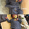 baby, baby_clothing, blanket, child, close_up, dark_hair, face, gray_outfit, growth_montage, indoor, infant, lying_down, newborn, pacifier, plush_blanket, portrait, smiling, text_overlay, two_months, two_weeks