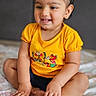 Kaeya joined the competition — help win amazing prizes! barefoot, bed, bedspread, butterfly, child, close_up, colorful, cross_legged, earrings, girl, hair_buns, happy, home, indoor, natural_light, portrait, sitting, smiling, toddler, yellow_shirt
