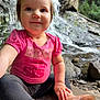 toddler, child, pink_shirt, best_sis_text, leggings, waterfall, rocks, outdoor, nature, smile, sitting, playful_hair_clip, curious, sunlight, water, forest, happy, cute, person, casual_clothing