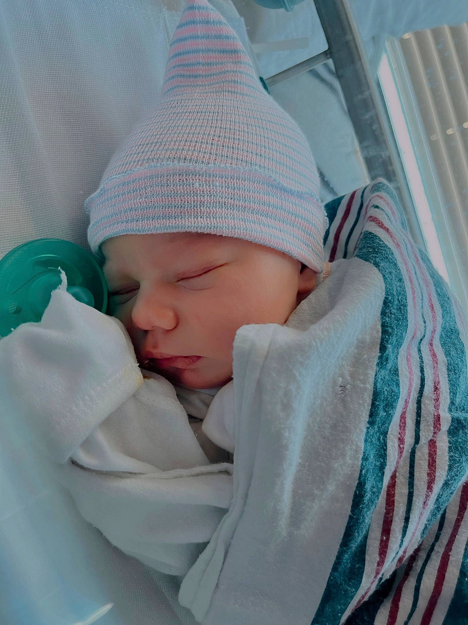 Kolsen joined the competition — help win amazing prizes! baby, baby_products, baby_sleeping, baby_toddler_clothing, beanie, bonnet, cap, child, comfort, headwear, hoodie, knit_cap, knitting, linens, pattern, person, sitting, sleeve, textile, toddler