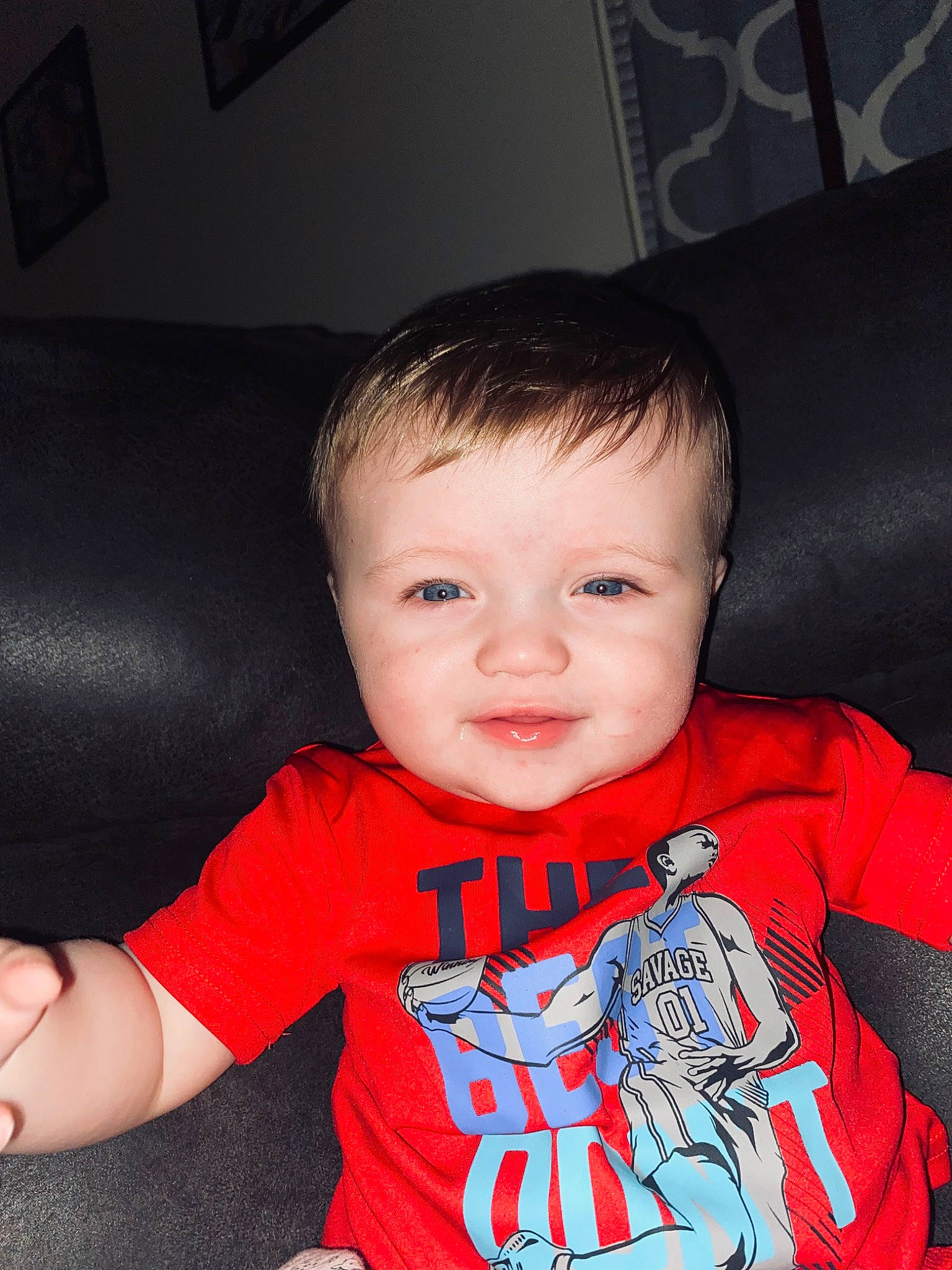 Everett is registered to the contest to win money with this photo: arm, baby_toddler_clothing, cheek, chin, cool, eye, facial_expression, finger, flash_photography, hairstyle, happy, head, human, human_body, mouth, nose, person, skin, sleeve, smile