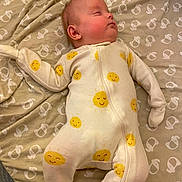 Julia joined the competition — help win amazing prizes! baby, bed, blanket, clothing, crib, cushion, face, furniture, head, homedecor, infantbed, newborn, pajamas, person, photography, portrait, quilt, sleeping, sleeve, yawning