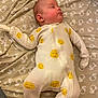 baby, bed, blanket, clothing, crib, cushion, face, furniture, head, homedecor, infantbed, newborn, pajamas, person, photography, portrait, quilt, sleeping, sleeve, yawning