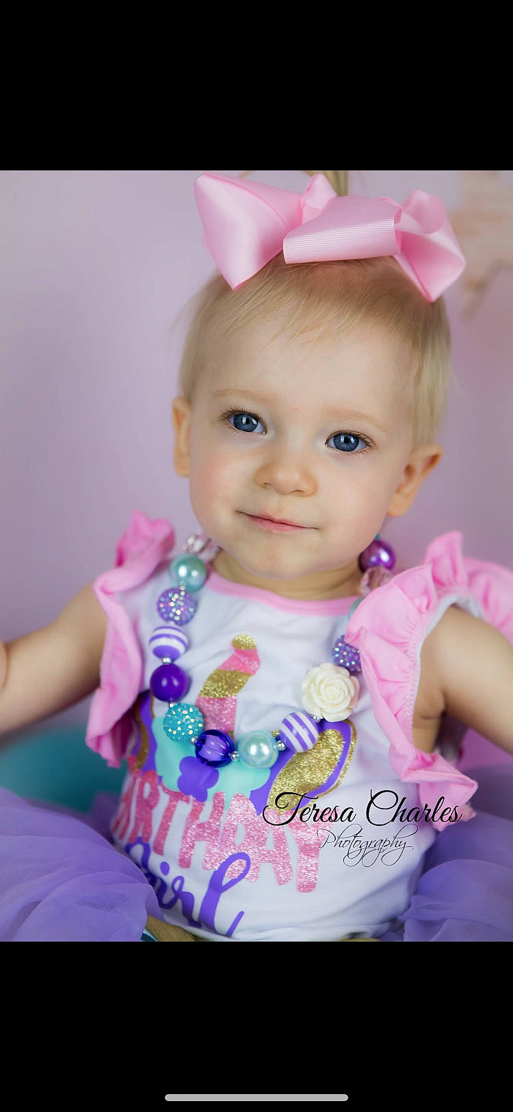 Emmalynn is registered to the contest to win money with this photo: baby, baby_products, baby_toddler_clothing, child, fashion_accessory, hair_accessory, headband, headgear, party, pattern, person, pink, product, smile, toddler