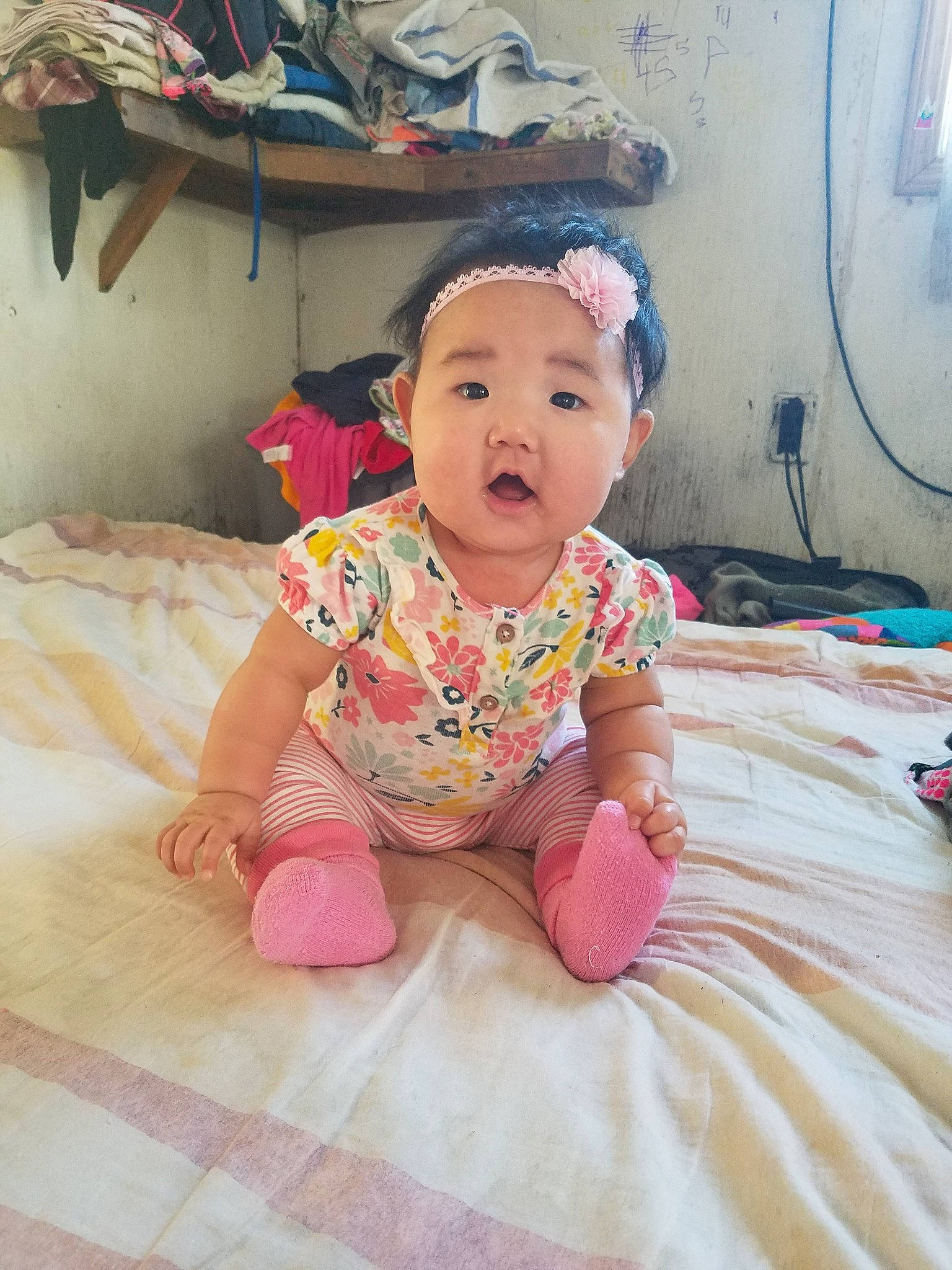 Kaeley joined the competition — help win amazing prizes! baby, baby_toddler_clothing, cheek, child, face, head, headgear, person, pink, play, sitting, skin, smile, surprise, toddler