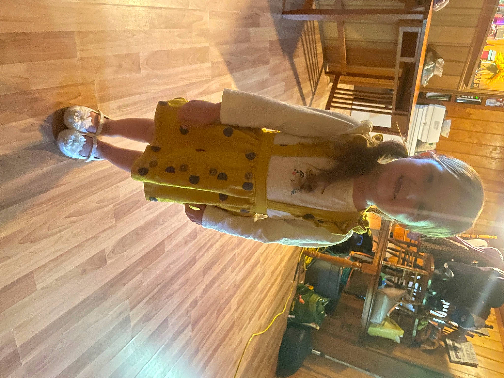 Addalynn is registered to the contest to win money with this photo: building, ceiling, engineering, floor, flooring, fun, hardwood, headwear, human_leg, leisure, machine, pattern, person, plywood, room, shadow, space, thigh, varnish, wood