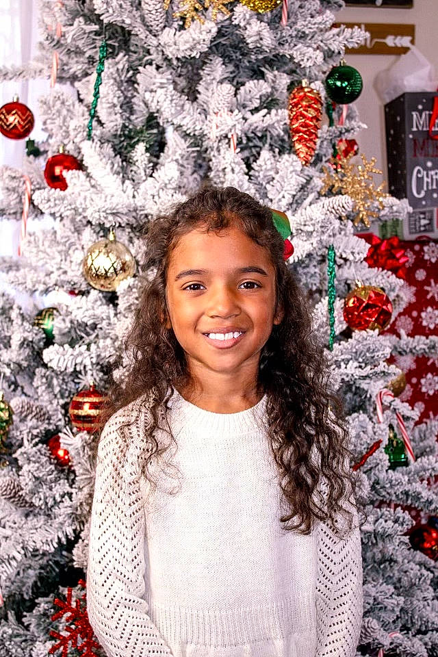 Layana joined the competition — help win amazing prizes! branch, christmas_decoration, christmas_ornament, eye, facial_expression, fashion, freezing, happy, holiday_ornament, human, iris, joy, organ, ornament, outerwear, person, photograph, plant, smile, standing