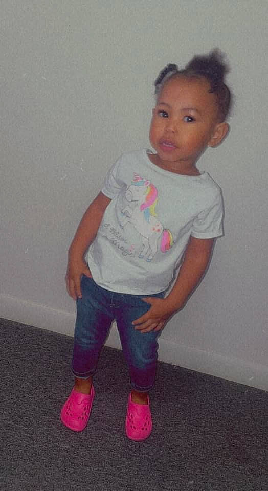 Laylani is registered to the contest to win money with this photo: baby_toddler_clothing, cheek, eye, face, happy, head, human_body, knee, lip, neck, nose, person, shorts, shoulder, skin, sleeve, sock, t_shirt, thigh, toddler