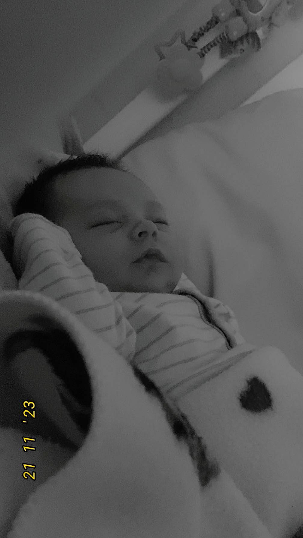 Braxton is registered to the contest to win money with this photo: baby, baby_sleeping, bedtime, black_and_white, comfort, eye, eyebrow, eyelash, flash_photography, gesture, happy, head, iris, monochrome, monochrome_photography, mouth, nose, organ, person, skin